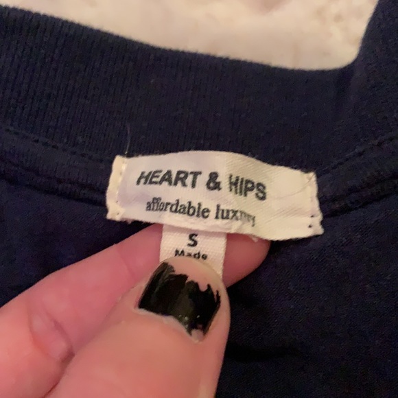 This is a relatively new shirt but sadly there is a small hole in it. - Picture 2 of 3